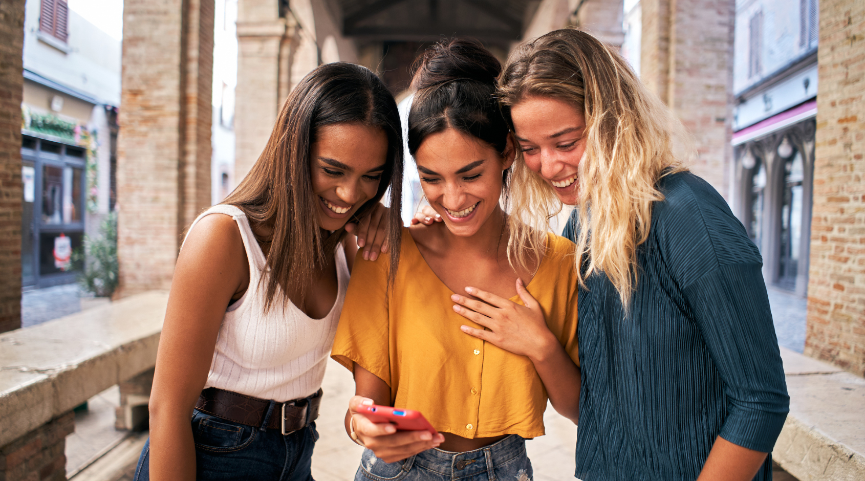 women looking at cellphone