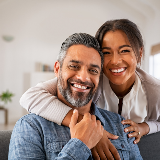 man and woman smiling