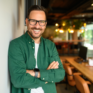 man with glasses in restaurant
